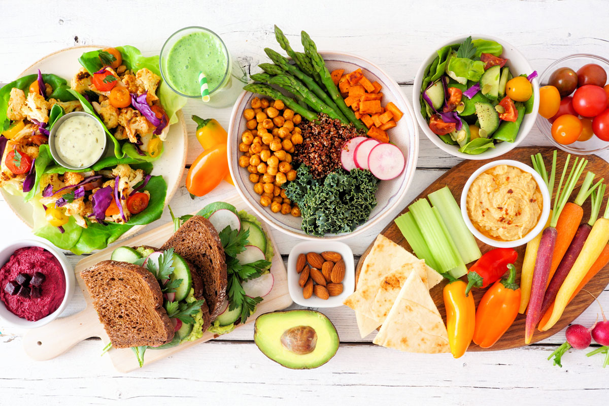 Various types of healthy foods laid on a table ready to be eaten